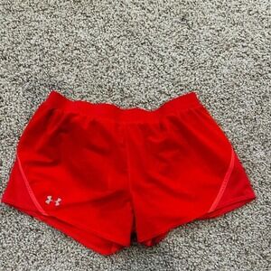 Bright Under Armour workout shorts designed for performance Size L